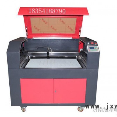 供應(yīng)旭澤xz-6090樹脂工藝標(biāo)牌激光雕刻機(jī)